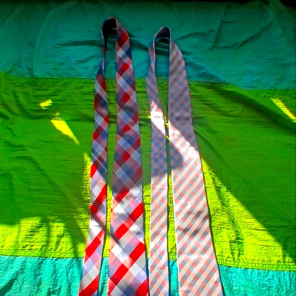 100% silk neckties. Offering as a pair. Great Deal!